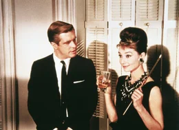 George Peppard (Paul Varjak), Audrey Hepburn (Holly Golightly).