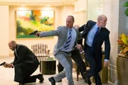 Centre - Jonathan Montgomery (Christopher Meloni) and right - Hubert (Bruce Willis) caught between fires Centre - Jonathan Montgomery (Christopher Meloni) and right - Hubert (Bruce Willis) caught between fires