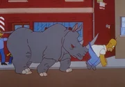 Homer wird von einem ausgebrochenen Rhinozeros aufs Horn genommen.