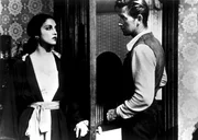 Der eifers&uuml;chtige Harvey (Lloyd Bridges) vermutet, dass Sheriff Kane Helen Ramirez (Katy Jurado) besucht hat, die dieser fr&uuml;her einmal gut kannte. Aber Helen schweigt und weist Harvey die T&uuml;r.
