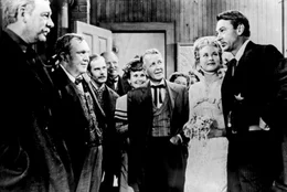Grace Kelly (Amy Kane, 2.v.re.), Gary Cooper (Marshal Will Kane, re.).