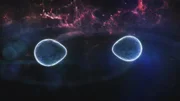 Zwei sich umkreisende Neutronensterne werden durch ihre Gezeitenkräfte verformt. Zwei sich umkreisende Neutronensterne werden durch ihre Gezeitenkräfte verformt.