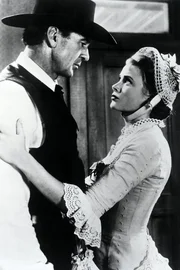Amy (Grace Kelly), die junge Frau, die soeben mit Will Kane (Gary Cooper) Hochzeit feierte, versteht ihren Mann nicht mehr. Dennoch weiss Kane, dass sein pers&ouml;nliches Gl&uuml;ck im Moment nicht z&auml;hlt.