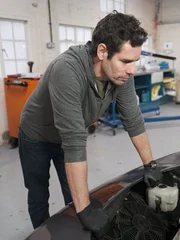 Marc (Elvis) Priestley at the garage working on the TVR.