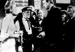 Grace Kelly (Amy Kane), Gary Cooper (Marshal Will Kane).