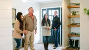 Homeowners Deanna and Paul King are all smiles as hosts Joanna and Chip show them their newly renovated home, as seen on Fixer Upper. (action)