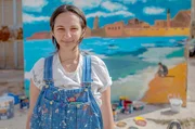Dalal Mitwally ist Street-Art-K&uuml;nstlerin und geh&ouml;rt zu einer Gruppe von rund 20 jungen Menschen, die mit ihren Kunstwerken die Stadt versch&ouml;nern wollen.