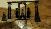 Tutanchamun auf einem Thron mit zwei Mitgliedern des königlichen Hofes, die neben ihm stehen. (Windfall Films) Tutanchamun auf einem Thron mit zwei Mitgliedern des königlichen Hofes, die neben ihm stehen. (Windfall Films)