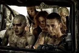 L-R: Nux (Nicholas Hoult), Cheedo the Fragile (Courtney Eaton), Capable (Riley Keough), Imperator Furiosa (Charlize Theron), The Dag (Abbey Lee)