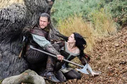 Chris Hemsworth (Huntsman), Kristen Stewart (Snow White).