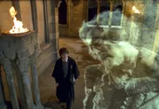 (L-r) Harry Potter (DANIEL RADCLIFFE) encounters Nearly Headless Nick (JOHN CLEESE) in Warner Bros. Pictures' "Harry Potter and the Chamber of Secrets."
