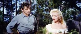 Auf der Flucht vor Indianern kommen sich Matt (Robert Mitchum, l.) und Kay (Marilyn Monroe, r.) bedeutend n&auml;her ...