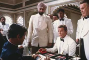 Louis Jourdan (Kamal), Kabir Bedi (Gobinda), Roger Moore (James Bond).