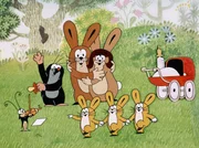Jubelstimmung auf der Wiese! Hase und H&auml;sin haben drei H&auml;schen als Nachwuchs bekommen. Da feiert der Maulwurf nat&uuml;rlich mit.