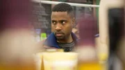 Richard is in the grocery store with a menacing look on his face.