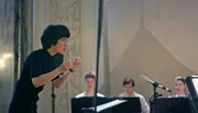 Hyunju Kwon m&ouml;chte hoch hinaus. Die junge Dirigentin verf&uuml;gt &uuml;ber eine magische Kraft, die jeden Chor, vor dem sie steht, sofort verzaubert.