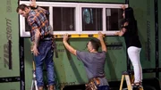 Christina Schuster wants to get her hands dirty as she helps her builders Clint and Sean install the windows in her tiny home, as seen on Tiny House, Big Living. Christina Schuster wants to get her hands dirty as she helps her builders Clint and Sean install the windows in her tiny home, as seen on Tiny House, Big Living.