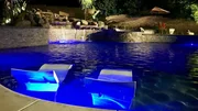 At night the Tiemann pool takes on another life with ample lighting accents, like that on the Baja shelf, or out by the water feature. At night the Tiemann pool takes on another life with ample lighting accents, like that on the Baja shelf, or out by the water feature.