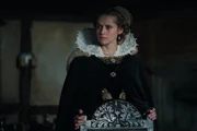 In the present day, Domenico finds a brutalised body in Oxford and suspects a mysterious affliction called blood rage has returned. In 1590, Matthew is forced to beg forgiveness from Father Hubbard for executing Tom Caldwell &ndash; the sort of conflict he had hoped to avoid. Diana and Matthew are introduced to John Dee by Mary Sidney. They explore his library, hoping to find clues to the whereabouts of the Book of Life. Dee tells them his scryer Edward Kelley stole a valuable book from him and is now hiding in Bohemia, and Matthew and Diana suspect it must be the Book of Life. Goody Alsop teaches Diana about weaving and knots, and Diana is overwhelmed to discover a new world of magic open up to her. In the present, Em practises higher magic to try and reach Diana&rsquo;s mother, Rebecca, in order to help her niece get closer to the Book. Matthew suspects that Kit has betrayed Diana&rsquo;s identity to Cecil. A cautious Matthew and Diana meet with Queen Elizabeth I, who accuses Matthew of betraying her by marrying Diana. As a test of loyalty, she orders them to bring Edward Kelley home from the clutches of King Rudolf, so that she can claim the Philosopher&rsquo;s Stone, the secret to eternal life which Kelley had promised. Before they can leave however, Gallowglass arrives with a message from Matthew&rsquo;s father Philippe &ndash; summoning Matthew and Diana to France.