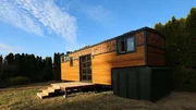 The SO Tiny Homes crew surprised tiny home owner Michael Thompson with a garage beneath the gooseneck to store his motorcycle, as seen on Tiny House, Big Living.