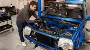 ELVIS WORKING ON OPEN BONNET. ELVIS WORKING ON OPEN BONNET.