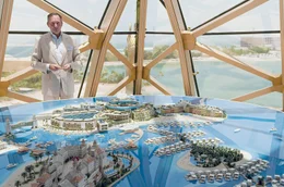 Josef Kleindienst zeigt das Modell von &bdquo;The World": Die k&uuml;nstlichen Inseln vor der K&uuml;ste Dubais sollen aus der Luft betrachtet wie eine Weltkarte aussehen. Durch die Finanzkrise 2008 kam das Projekt zum Stillstand.