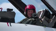 Joe in cockpit of jet.