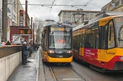 Stadtbahnen am Karlsruher Europaplatz im Stadtzentrum. Mit 11 Jahren begann sich der in Karlsruhe geborene Carsten Str&auml;hle, f&uuml;r den Betrieb von Stadtbahnen zu interessieren.