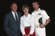 L-R: David Brice (Gene Hackman), Susan Atwell (Sean Young) und Tom Farrell (Kevin Costner)