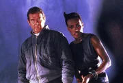 James Bond (Roger Moore), May Day (Grace Jones)