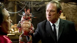 Keone Young (left) and Tommy Lee Jones holding "Spiky Bulba" in Columbia Pictures' MEN IN BLACK 3.
