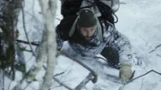 Hazen Audel carefully climbs a steep snow cliff using only his hands and feet. (National Geographic/Icon Films)