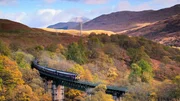 Train crossing a Highland viaduct along the Main Highland Line in Scotland which is monitored by Network Rail Ecologists protecting local wildlife. July 2021. Train crossing a Highland viaduct along the Main Highland Line in Scotland which is monitored by Network Rail Ecologists protecting local wildlife. July 2021.
