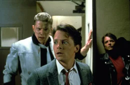 L-R: Tannen (Thomas F. Wilson), Marty McFly (Michael J. Fox), Marty McFly (Michael J. Fox)