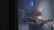 Victim lays across bed after the assault. Victim lays across bed after the assault.