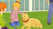 H&uuml;ndin Polly ist ganz brav und l&auml;sst sich geduldig von Conni streicheln.