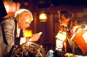 Christopher Lloyd (Dr. Emmett Brown), Michael J. Fox (Marty McFly).