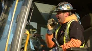 Mitch Blaschke on radio in excavator Mitch Blaschke on radio in excavator