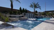 Beautifully finished jucuzzi with bubbles going, eletric fire place, and the pool right next to the jucuzzi, as seen on Pool Kings. Beautifully finished jucuzzi with bubbles going, eletric fire place, and the pool right next to the jucuzzi, as seen on Pool Kings.