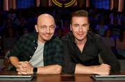 Rateteam-Kapit&auml;n Bernhard Ho&euml;cker (l.) und der S&auml;nger Eric Philippi (r.) bilden ein Rateteam.