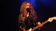 Lisa rocking out to the song they wrote. Lisa rocking out to the song they wrote.