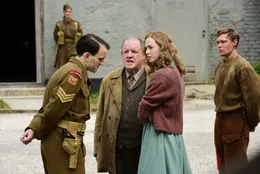 L-R: Sgt. Smythe (Harry Melling), Jack Friar (John Henshaw), Margaret (Freya Mavor), Bert Trautmann (David Kross)
