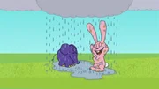 Elefant und Hase haben Spaß mit dem Regenwasser. Elefant und Hase haben Spaß mit dem Regenwasser.