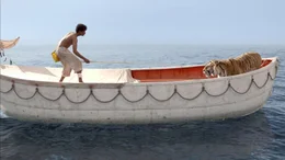 Auf der &Uuml;berfahrt nach Kanada ger&auml;t das Schiff in einen Sturm und kentert. Der indische Junge Pi (Suraj Sharma) kann sich scheinbar als Einziger in ein Rettungsboot fl&uuml;chten - bis er den riesigen K&ouml;nigstiger Richard Parker unter der Plane entdeckt ...