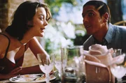 Der von Geschwindigkeit besessene Taxifahrer Daniel (Samy Nac&eacute;ri, r.) l&auml;sst sich in seiner Beziehung zu Lilly (Marion Cotillard, l.) viel Zeit ..._Titel: Taxi, Taxi