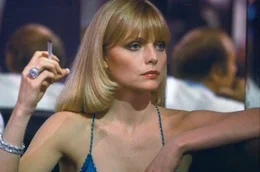 Elvira Hancock (Michelle Pfeiffer) ist die Geliebte des Drogenbarons Frank Lopez und wird zudem von Tony Montana begehrt.