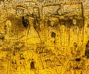 Eine Darstellung der Heiligen Katharina mit dem Rad, die zu den gr&ouml;&szlig;ten christlichen Schnitzereien in der Royston-H&ouml;hle z&auml;hlt.