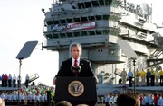 President Bush declares the end of major combat in Iraq as he speaks aboard the aircraft carrier USS Abraham Lincoln off the California coast, in this May 1, 2003 file photo. Democratic congressional leaders on Tuesday, May 1, 2007 sent Iraq legislation setting timetables for U.S. troop withdrawals to President George W. Bush and a certain veto. On the fourth anniversary of the president's "Mission Accomplished" speech, Senate Majority Democratic Leader Harry Reid said that Bush "has put our troops in the middle of a civil war. A change of course is needed." (AP Photo/J. Scott Applewhite) President Bush declares the end of major combat in Iraq as he speaks aboard the aircraft carrier USS Abraham Lincoln off the California coast, in this May 1, 2003 file photo. Democratic congressional leaders on Tuesday, May 1, 2007 sent Iraq legislation setting timetables for U.S. troop withdrawals to President George W. Bush and a certain veto. On the fourth anniversary of the president's "Mission Accomplished" speech, Senate Majority Democratic Leader Harry Reid said that Bush "has put our troops in the middle of a civil war. A change of course is needed." (AP Photo/J. Scott Applewhite)