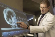 Dr. Bernard Merrick (Sean Bean)