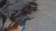 Aran Cecila is found underneath the snow after an avalanche. (Aleix Garcia)